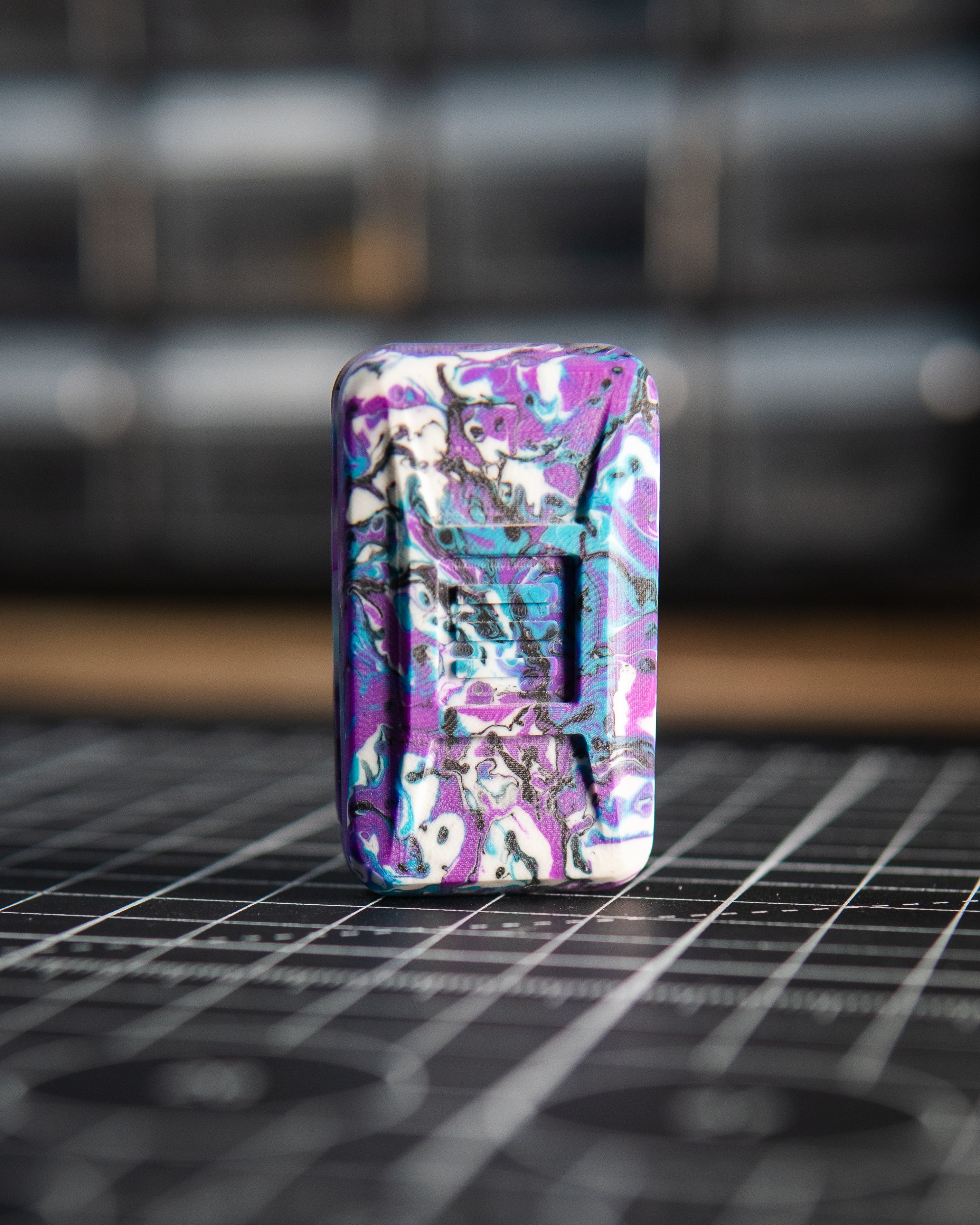 Delta Ergo Pro Tile Fidget Slider - Maker's Choice, Purple Rain Resin