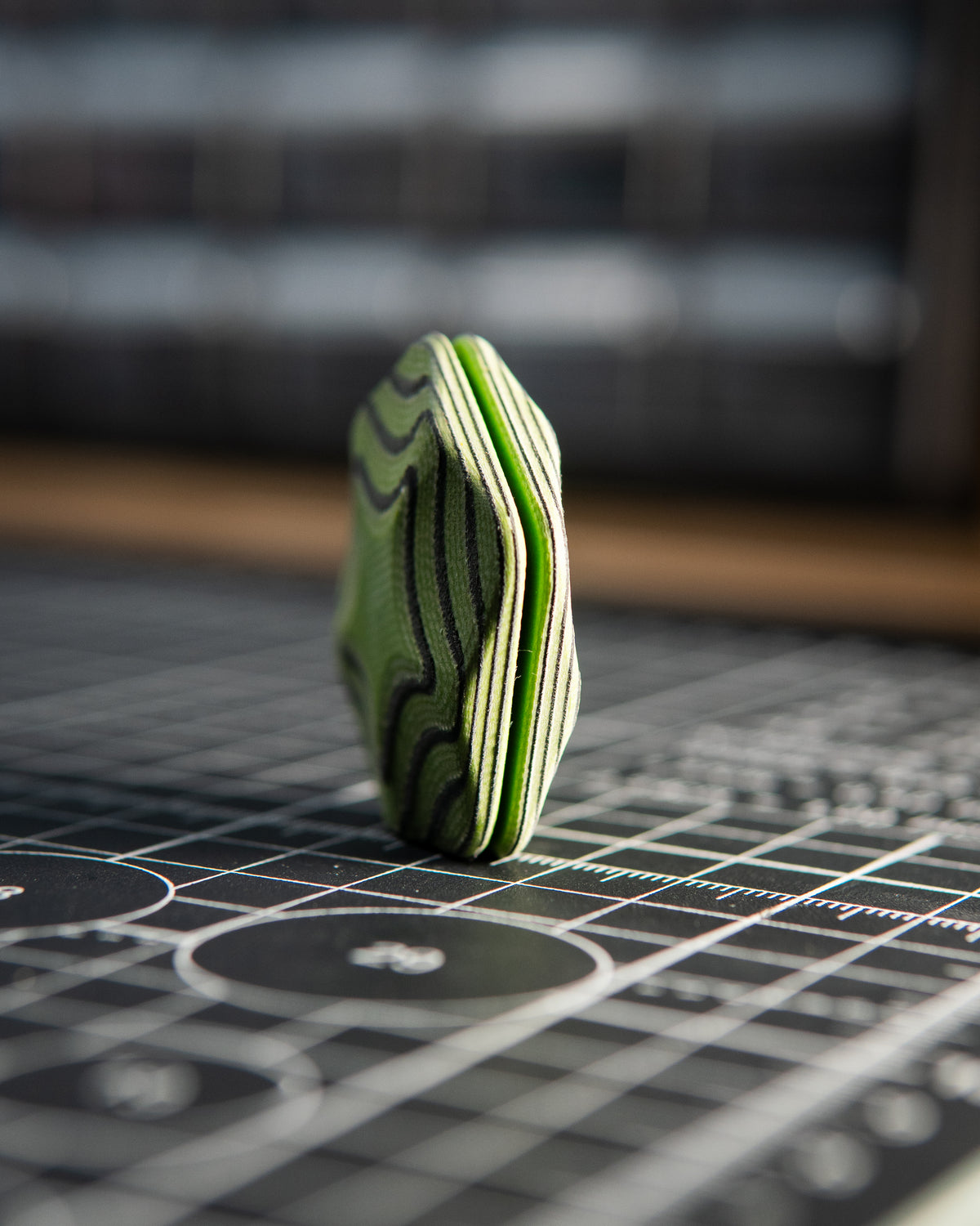 The ISO - Silent Magnetic Haptic Coin (AmeraGrip Lime Green G10 & Black)