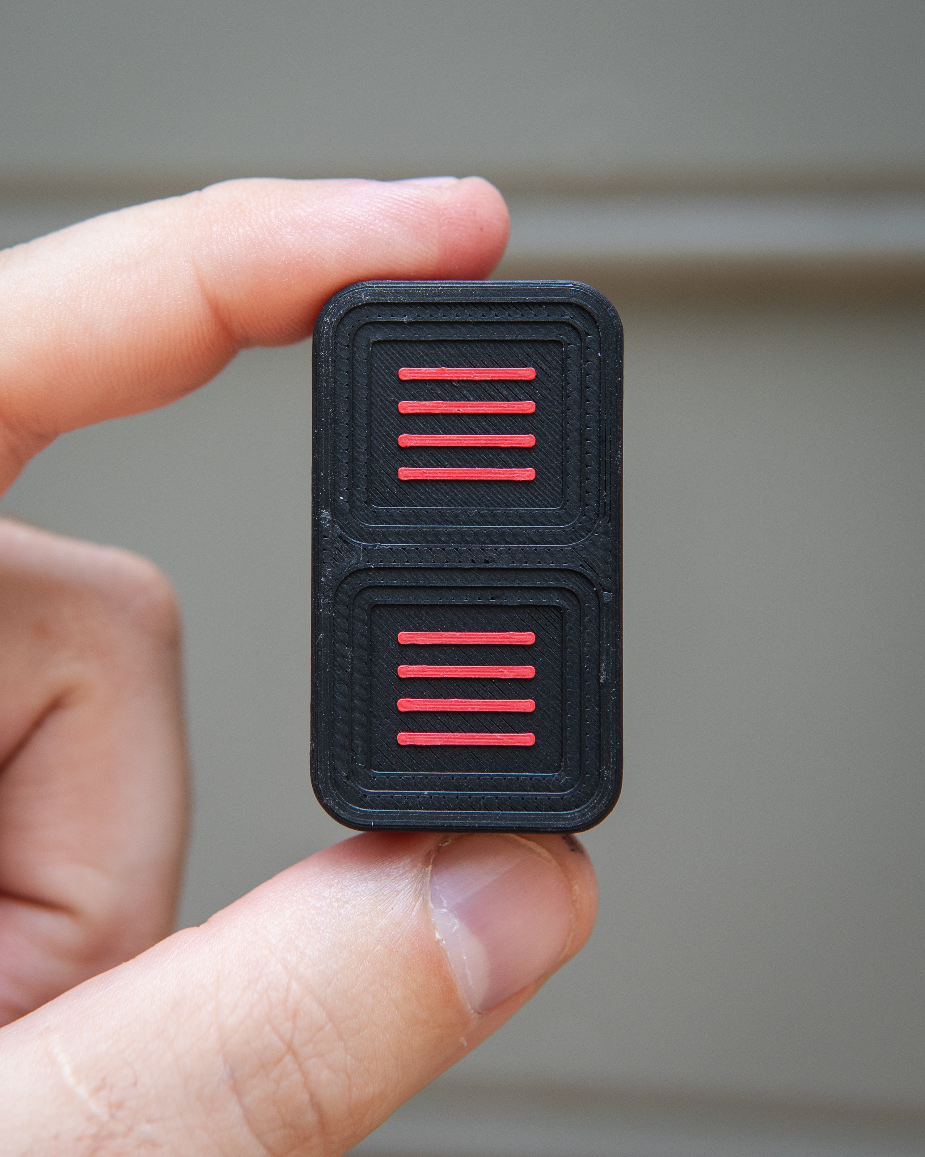 Delta Tile Fidget Slider - Maker's Choice, Black & Red Plastic