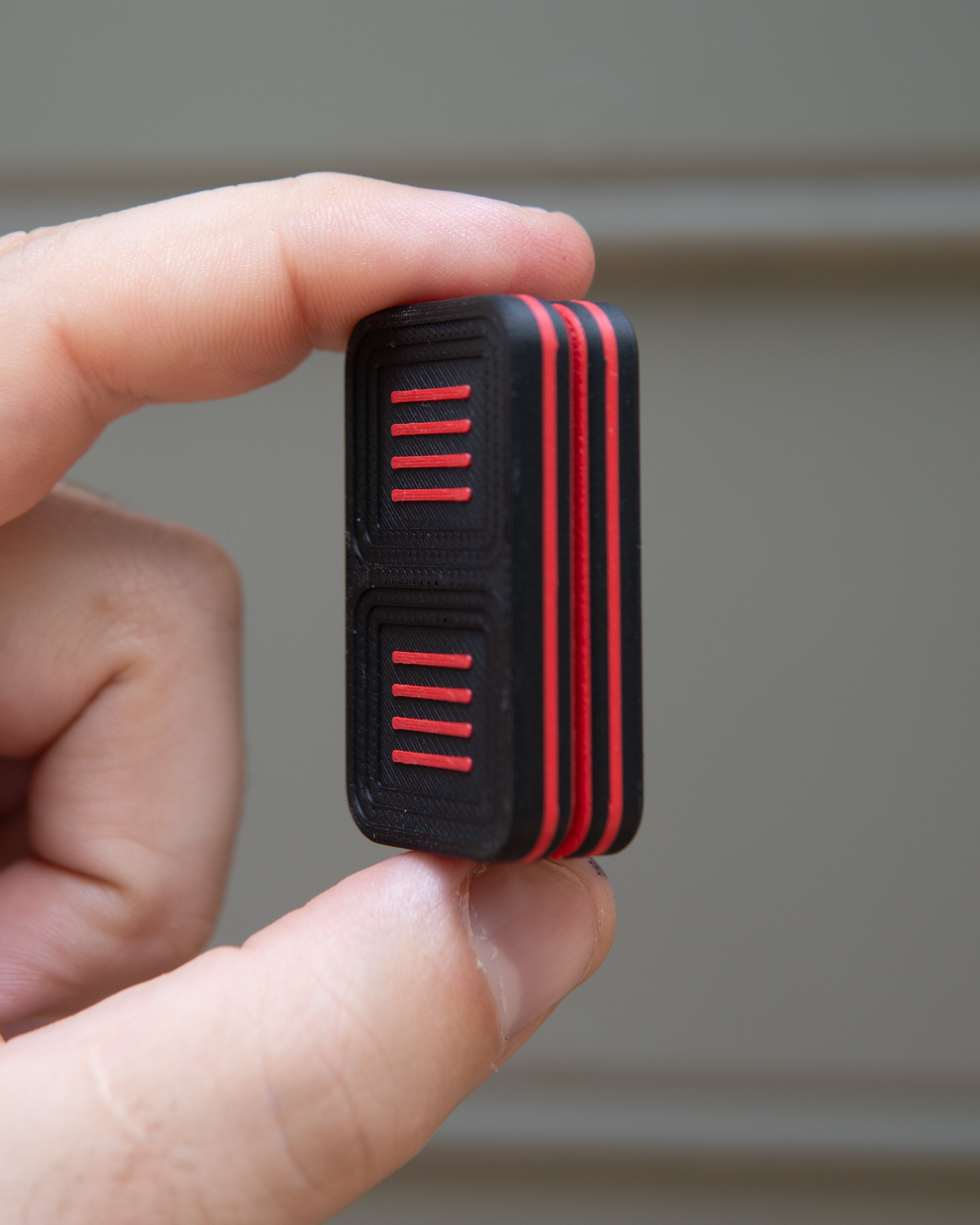 Delta Tile Fidget Slider - Maker's Choice, Black & Red Plastic