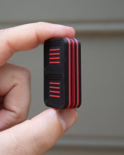 Delta Tile Fidget Slider - Maker's Choice, Black & Red Plastic