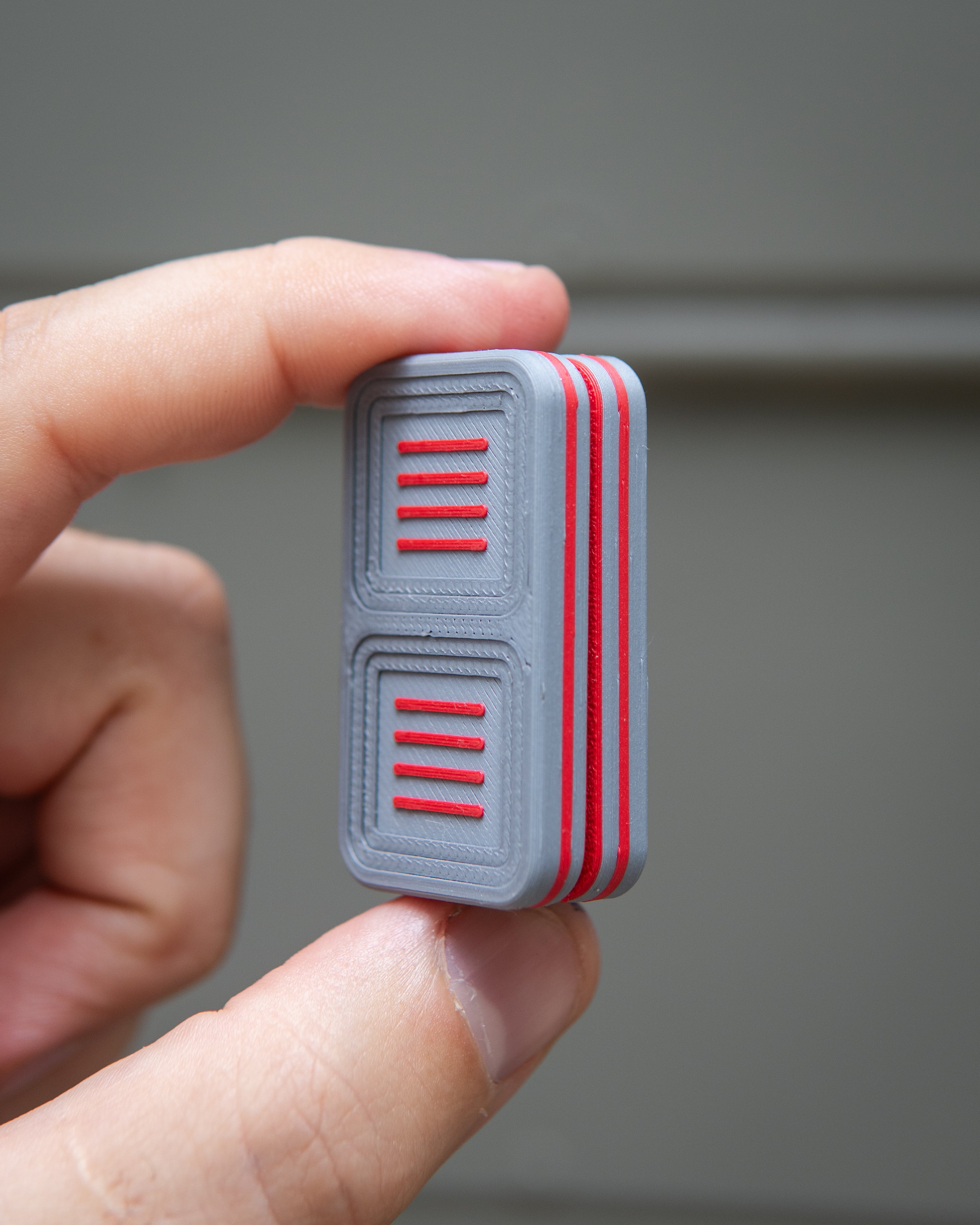 Delta Tile Fidget Slider - Maker's Choice, Gray & Red Plastic