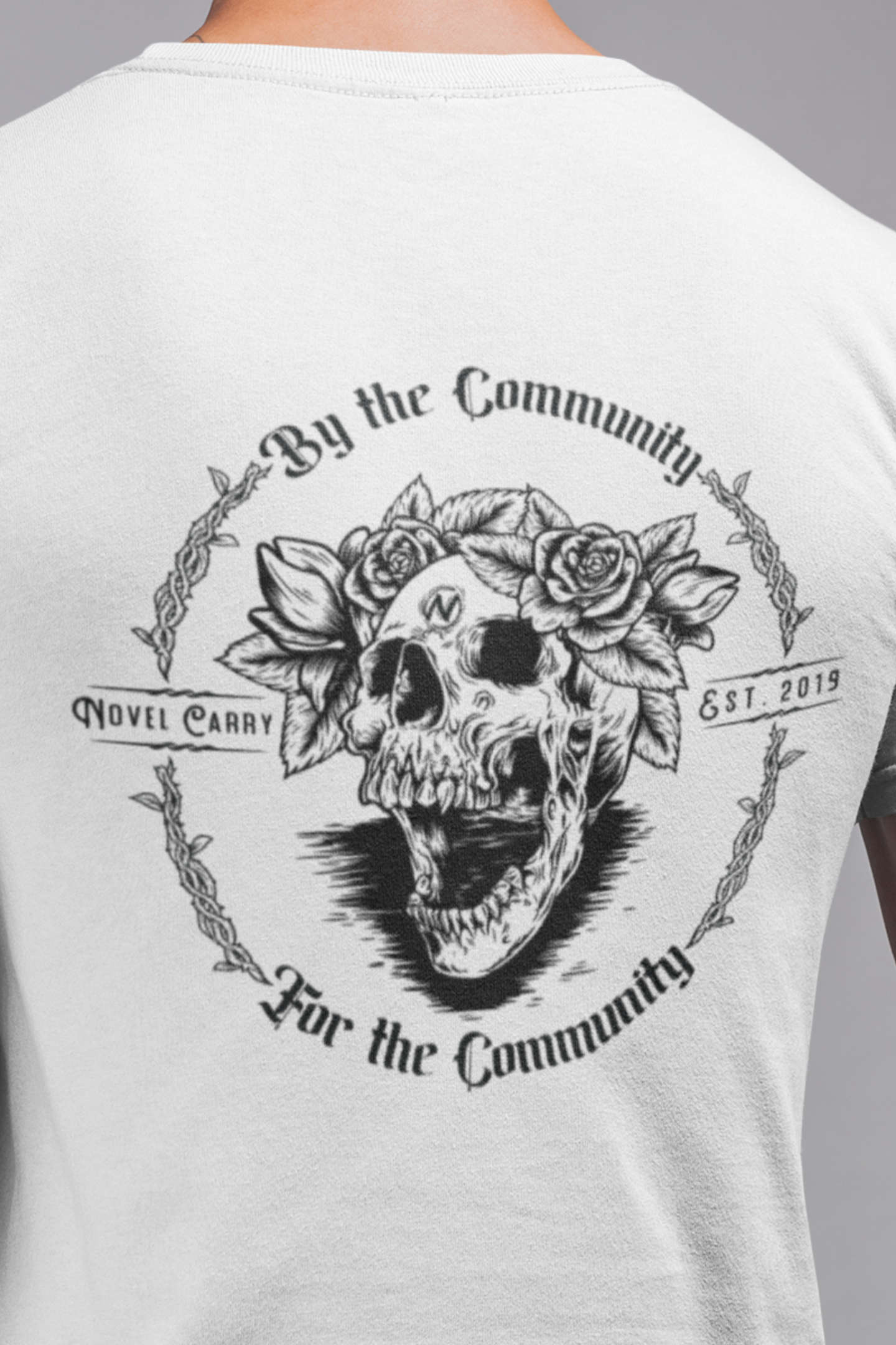 “By the Community” Novel Carry Heritage Tee