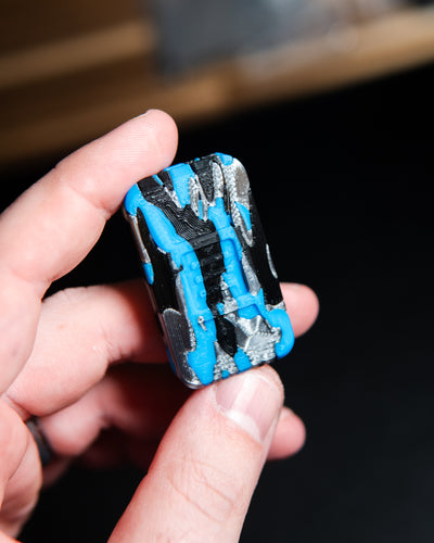 Delta Ergo Tile Fidget Slider - Tiger Camo Black/Silver/Blue Plastic