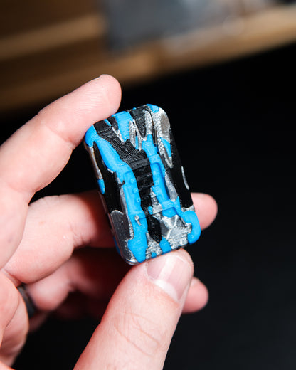 Delta Ergo Tile Fidget Slider - Tiger Camo Black/Silver/Blue Plastic