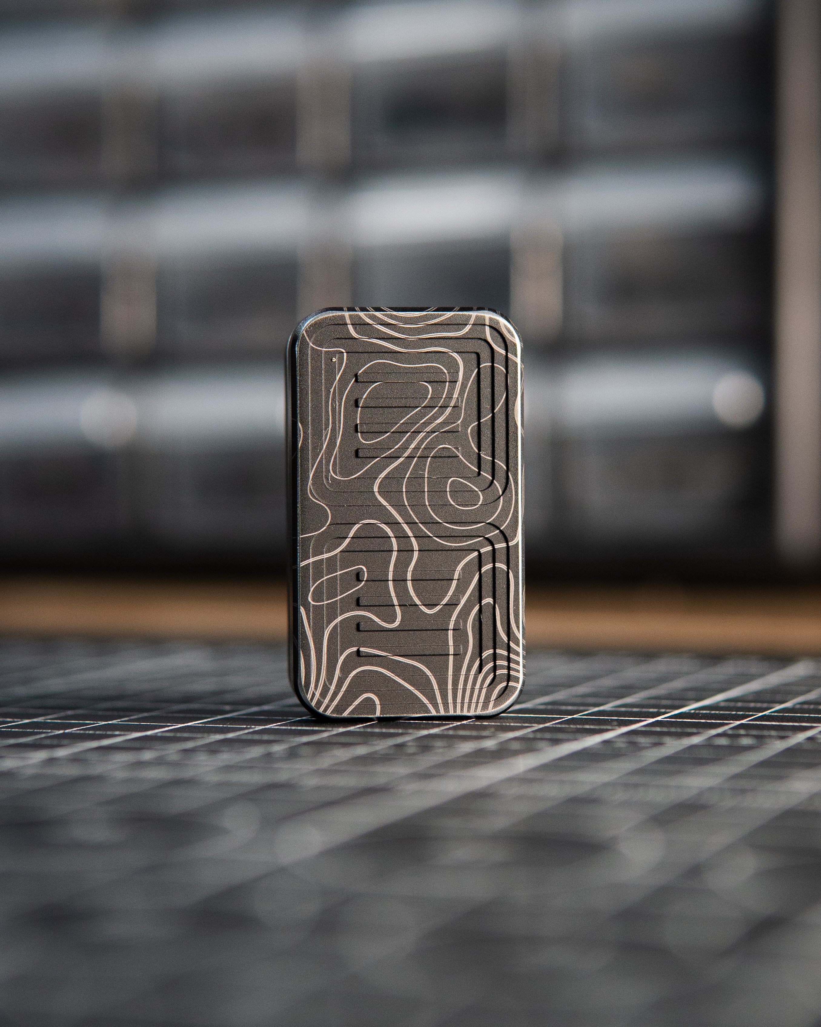 Delta Tile Fidget Slider - Maker's Choice, Aluminum Black Topo Engrave [BLEM]