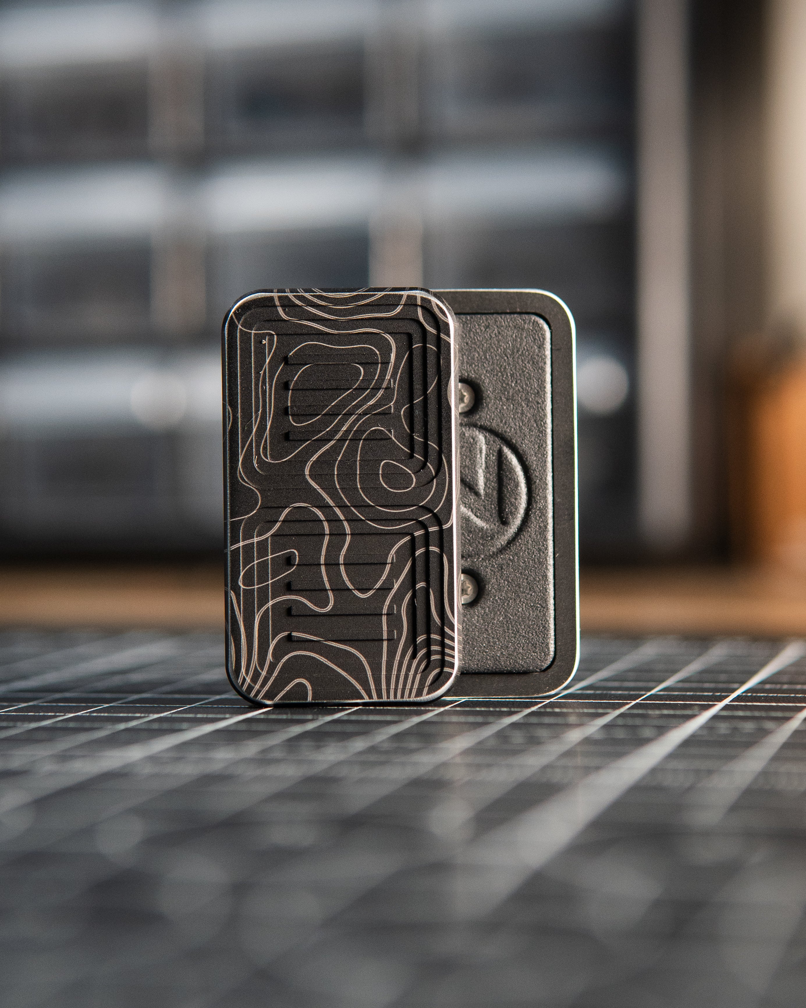 Delta Tile Fidget Slider - Maker's Choice, Aluminum Black Topo Engrave [BLEM]