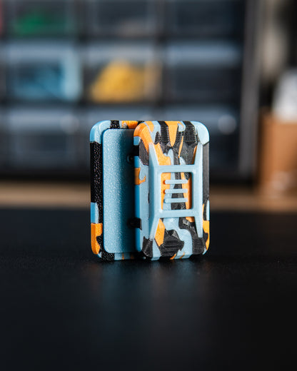Delta Ergo Tile Fidget Slider - Tiger Camo Blue Glow/Black/Orange
