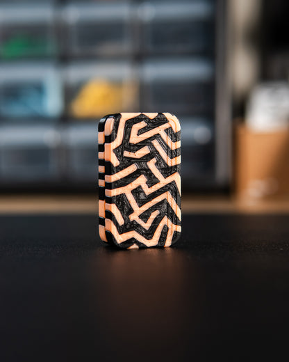 Delta Tile Fidget Slider - Metro Labyrinth, Glow Orange/Black