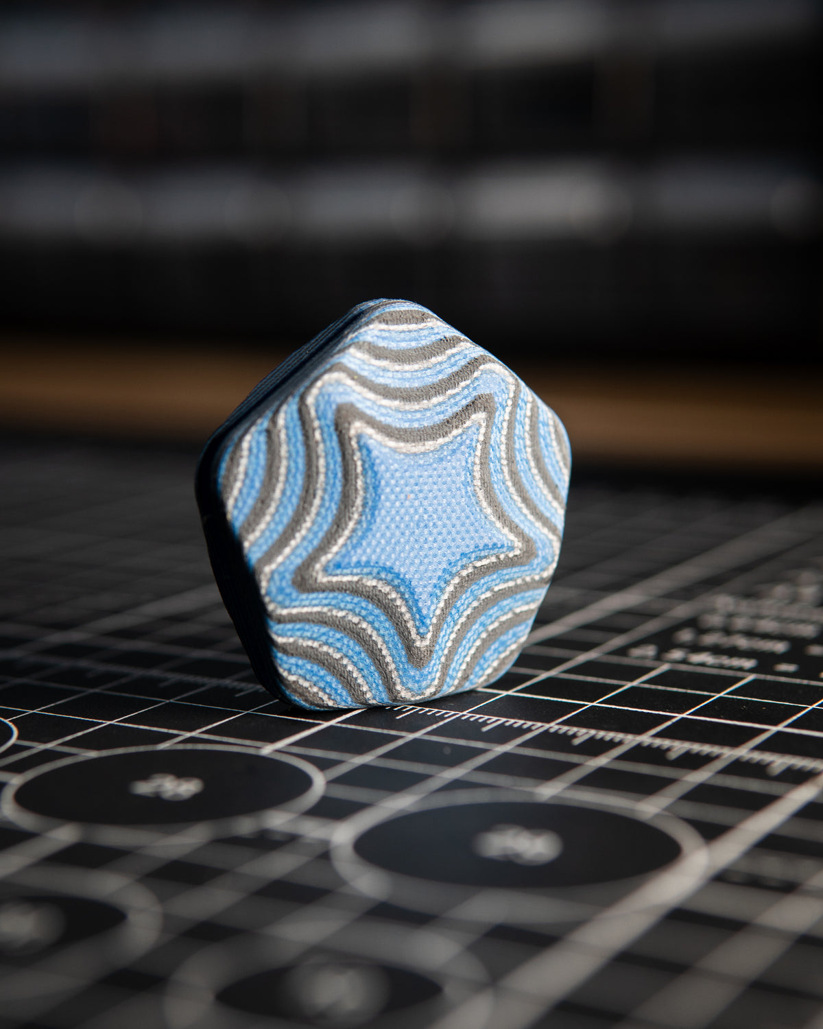 The ISO - Silent Magnetic Haptic Coin (AmeraGrip Blue G10 & Black)
