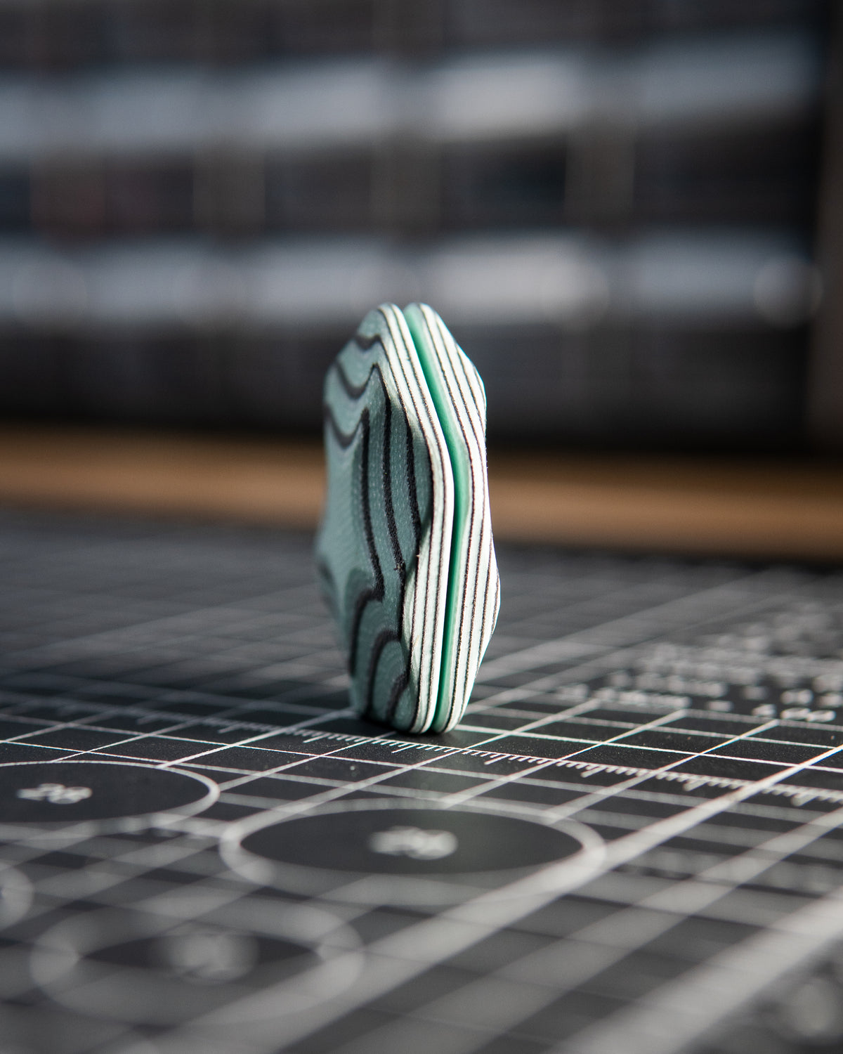 The ISO - Silent Magnetic Haptic Coin (AmeraGrip Tiffany Blue G10 & Black)