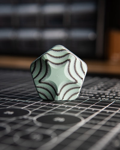 The ISO - Silent Magnetic Haptic Coin (AmeraGrip Tiffany Blue G10 & Black)